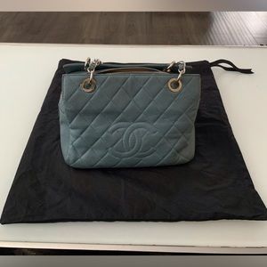 Authentic Chanel bag with dust bags and code.